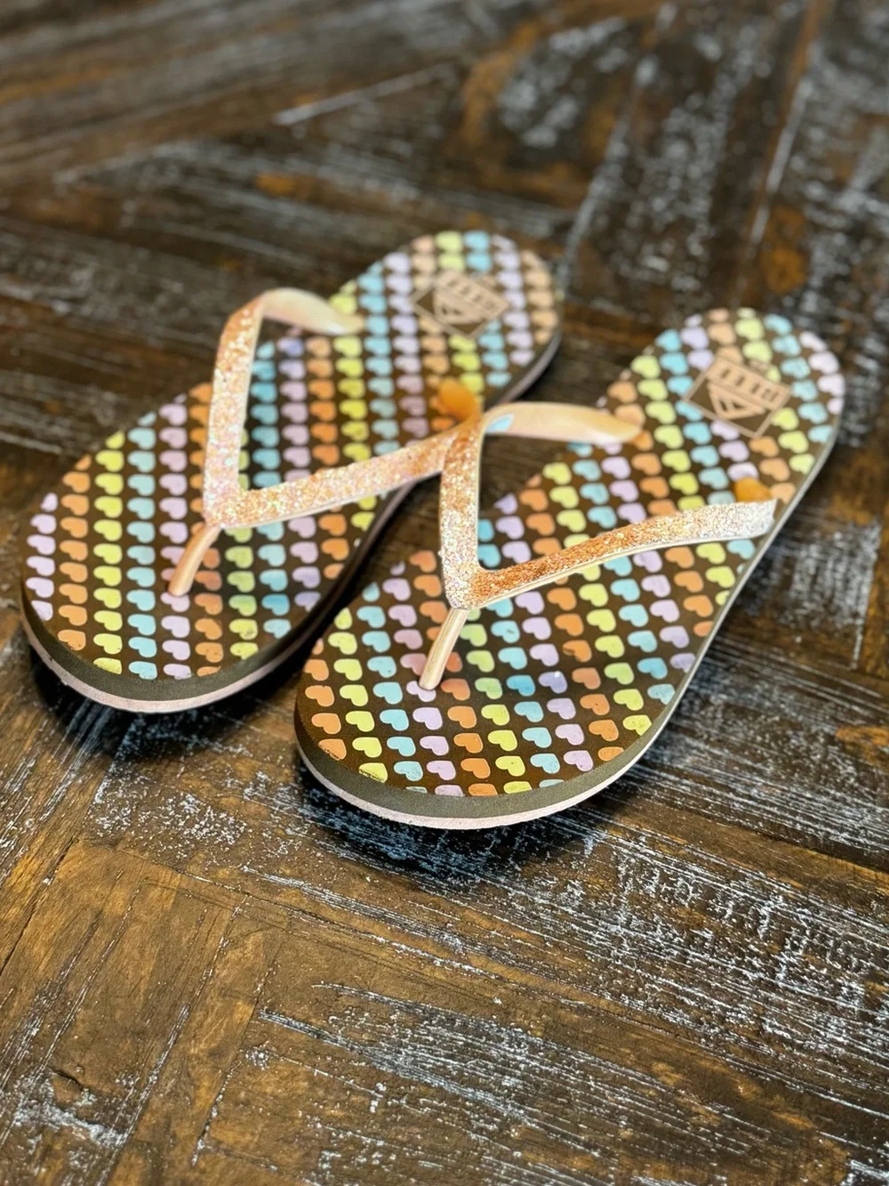 Reef Kids Flip Flops in Multicolor Heart Print with Pink Glitter Straps